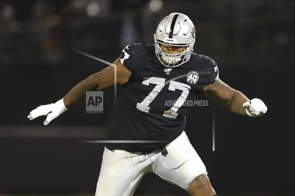 Peter Joneleit FILE - In this Sept. 9, 2019, file photo, Oakland Raiders offensive tackle Trent Brown (77) protects a gap in the offensive line during an NFL football game against the Denver Broncos, in Oakland, Calif. Raiders tackle Trent Brown has been sued by his ex-girlfriend and mother of his son for multiple acts of domestic violence over the past year. Diorra Marzette-Sanders filed a civil suit in Alameda County Superior Court on Tuesday, Oct. 15, 2019, detailing several attacks that left her bloodied, bruised and fearing for her safety. (AP Photo/Peter Joneleit, File)