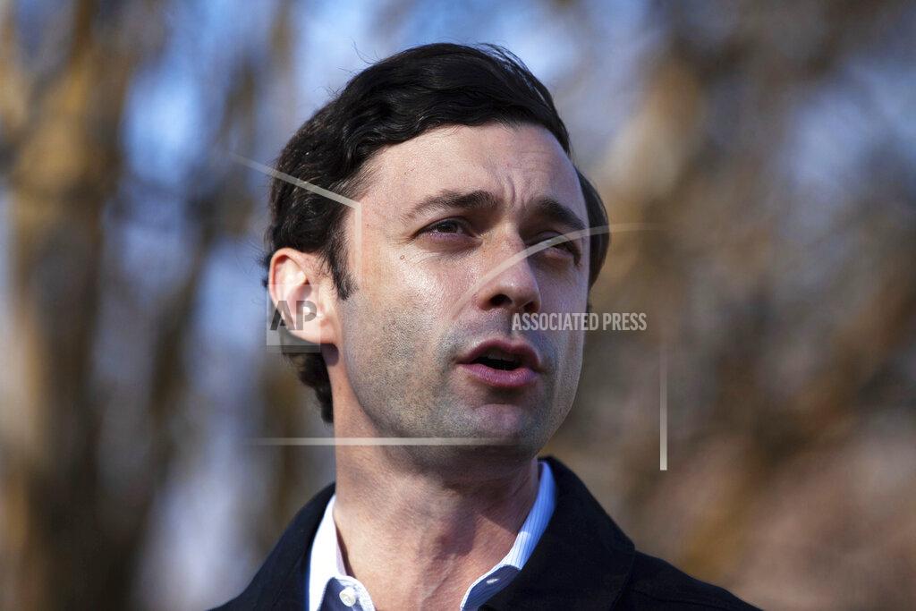 Branden Camp CORRECTS CITY TO ATLANTA Democratic U.S. Senate challenger Jon Ossoff speaks to the media at Dunbar Neighborhood Center during Georgia's Senate runoff elections, Tuesday, Jan. 5, 2021, in Atlanta, Ga. (AP Photo/Branden Camp)