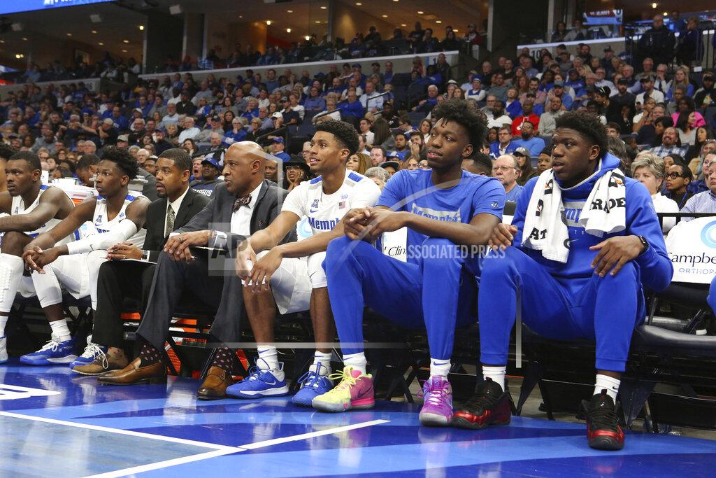 Karen Pulfer Focht Memphis' James Wiseman, second from right, watches the team's NCAA college basketball game against Arkansas-Little Rock on Wednesday, Nov. 20, 2019, in Memphis, Tenn. (AP Photo/Karen Pulfer Focht)