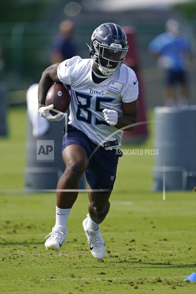 Mark Humphrey FILE - Tennessee Titans tight end Chig Okonkwo takes part in a drill at the NFL football team's practice facility June 1, 2022, in Nashville, Tenn. Okonkwo has a really good reason not to be working with the rest of the Titans' rookies as they wrap up their offseason at the team headquarters. Okonkwo, the rookie who ran the fastest 40-yard dash among tight ends earlier this year at the NFL Combine had somewhere better to be: Tight End University, (AP Photo/Mark Humphrey, File)