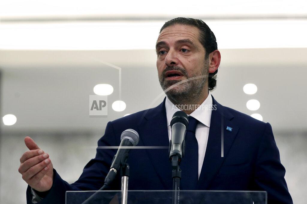 Bilal Hussein Lebanese Prime Minister-Designate Saad Hariri, speaks to journalists after his meeting with Lebanese President Michel Aoun, at the Presidential Palace in Baabda, east of Beirut, Lebanon, Thursday, March 18, 2021. Hariri said despite disagreements with the country's president there is still a chance to form a government to halt economic collapse and offer people hope. (AP Photo/Bilal Hussein)