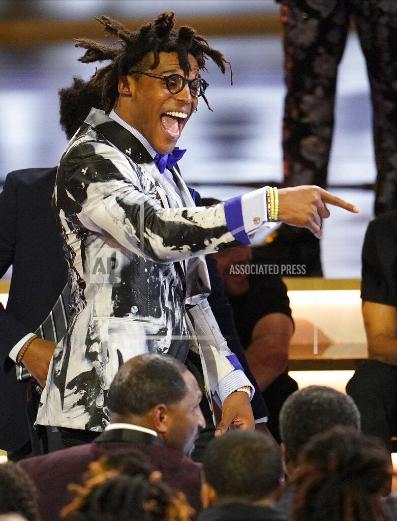 David J. Phillip Carolina Panthers quarterback Cam Newton arrives for the NFL Honors football award show Saturday, Feb. 1, 2020, in Miami. (AP Photo/David J. Phillip)