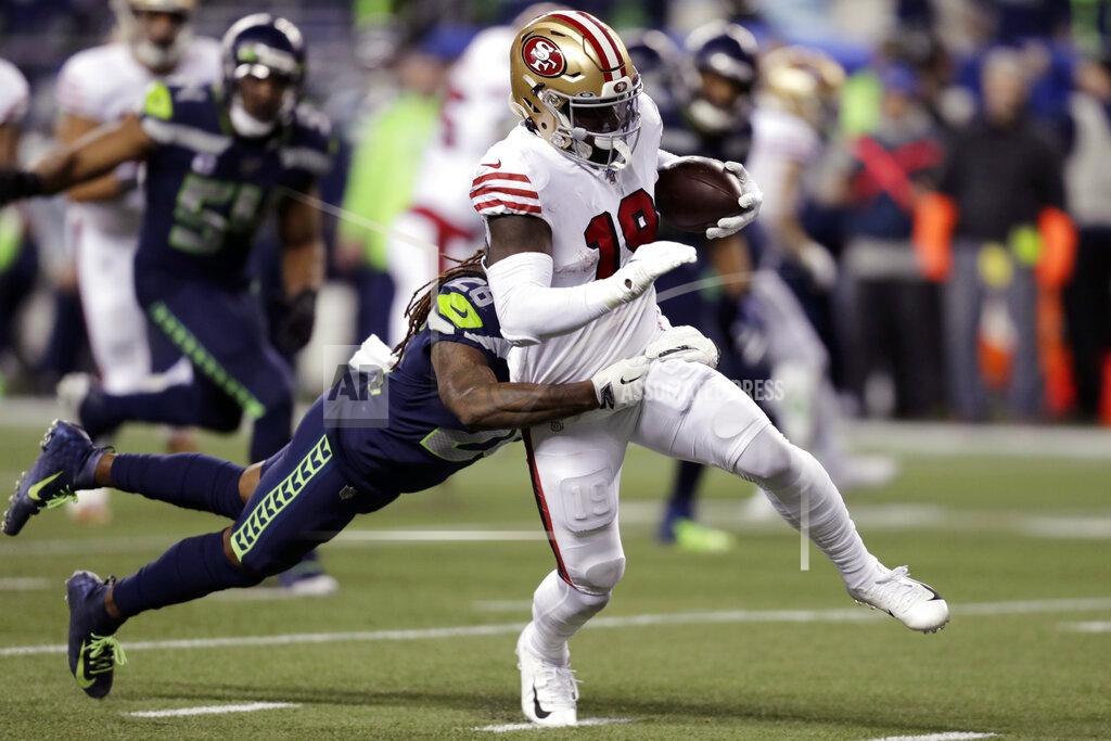 Stephen Brashear San Francisco 49ers' Deebo Samuel (19) carries the ball as Seattle Seahawks' Shaquill Griffin tries to pull him down during the second half of an NFL football game, Sunday, Dec. 29, 2019, in Seattle. (AP Photo/Stephen Brashear)