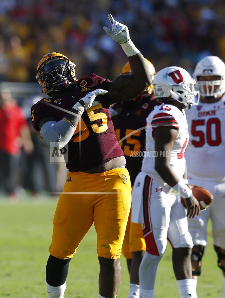 Rick Scuteri Arizona State defensive lineman Renell Wren (95) celebrates after sacking Utah quarterback Jason Shelley (15) in the second half of an NCAA college football game, Saturday, Nov. 3, 2018, in Tempe, Ariz. (AP Photo/Rick Scuteri)