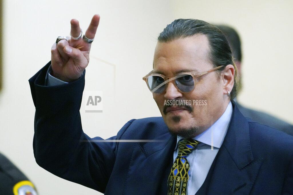 Steve Helber Actor Amber Heard arrives into the courtroom after a lunch break at the Fairfax County Circuit Courthouse in Fairfax, Va., Monday, May 23, 2022. Actor Johnny Depp sued his ex-wife Amber Heard for libel in Fairfax County Circuit Court after she wrote an op-ed piece in The Washington Post in 2018 referring to herself as a "public figure representing domestic abuse." (AP Photo/Steve Helber, Pool)