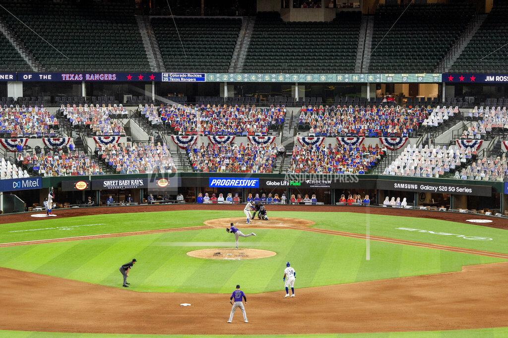 Jeffrey Mcwhorter The lower level seats at Globe Life Field are filled with cardboard cutouts depicting fans, dubbed "DoppleRangers," as Colorado Rockies pitcher German Marquez delivers to Texas Rangers' Joey Gallo during the sixth inning of an opening day baseball game Friday, July 24, 2020, in Arlington, Texas. (AP Photo/Jeffrey McWhorter)