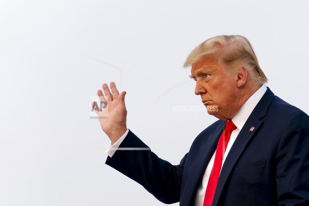 Andrew Harnik President Donald Trump arrives at Reno-Tahoe International Airport in Reno, Nev., Saturday, Sept. 12, 2020, to travel to a rally in Minden, Nev. (AP Photo/Andrew Harnik)