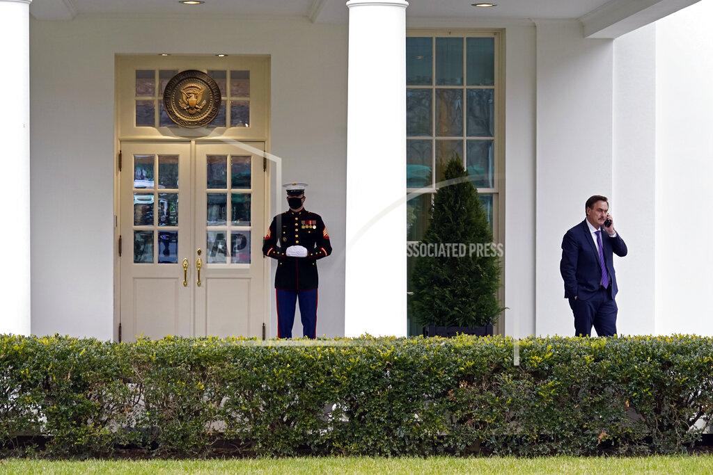 FILE - In this Jan. 15, 2021 file photo, Michael Lindell, CEO of My Pillow, Inc., waits to go into the West Wing of the White House in Washington. Lindell, is weighing a run for governor in Minnesota. If he follows through on a campaign, it could be an early test of where the Republican Party is headed in the post-Donald Trump era. (AP Photo/Gerald Herbert File)