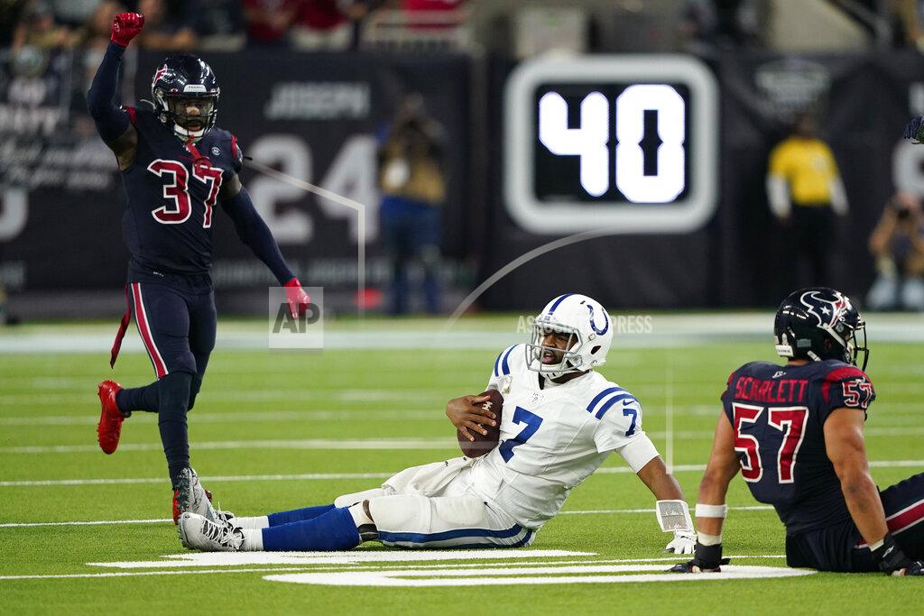 David J. Phillip Indianapolis Colts quarterback Jacoby Brissett (7) is stopped short of a first down during the second half of an NFL football game against the Houston Texans Thursday, Nov. 21, 2019, in Houston. (AP Photo/David J. Phillip)