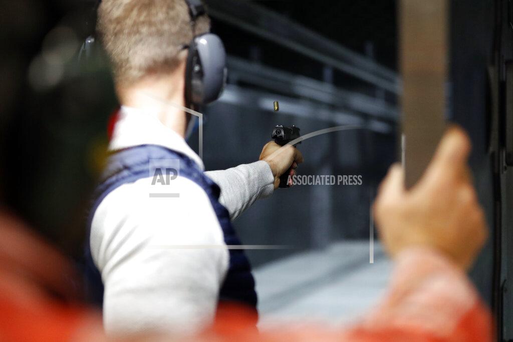 Shafkat Anowar Chicago resident Ray Mandel practices shooting during a session at Maxon Shooter's Supplies and Indoor Range, Friday, April 30, 2021, in Des Plaines, Ill. After a year of pandemic lockdowns, mass shootings are back, but the guns never went away. As the U.S. inches toward a post-pandemic future, guns are arguably more present in the American psyche and more deeply embedded in American discourse than ever before. The past year's anxiety and loss fueled a rise in gun ownership across political and socio-economic lines. (AP Photo/Shafkat Anowar)