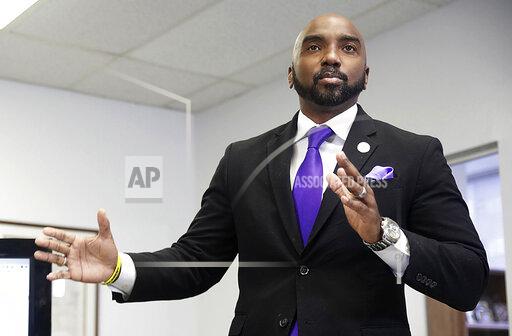FILE - In this Friday, June 26, 2020, file photo, attorney Damario Solomon-Simmons speaks during a news conference in Tulsa, Okla. On Friday, Jan. 14, 2022, an Oklahoma judge revoked the bond of Daniel Triplett, 67, a white local businessman accused of killing 51-year-old Brent Mack, a Black man who worked for him, after Triplett was spotted in a bank drive-through and at a local Waffle House in violation of his bond conditions. Solomon-Simmons represents Mack's family. (Mike Simons/Tulsa World via AP, File)