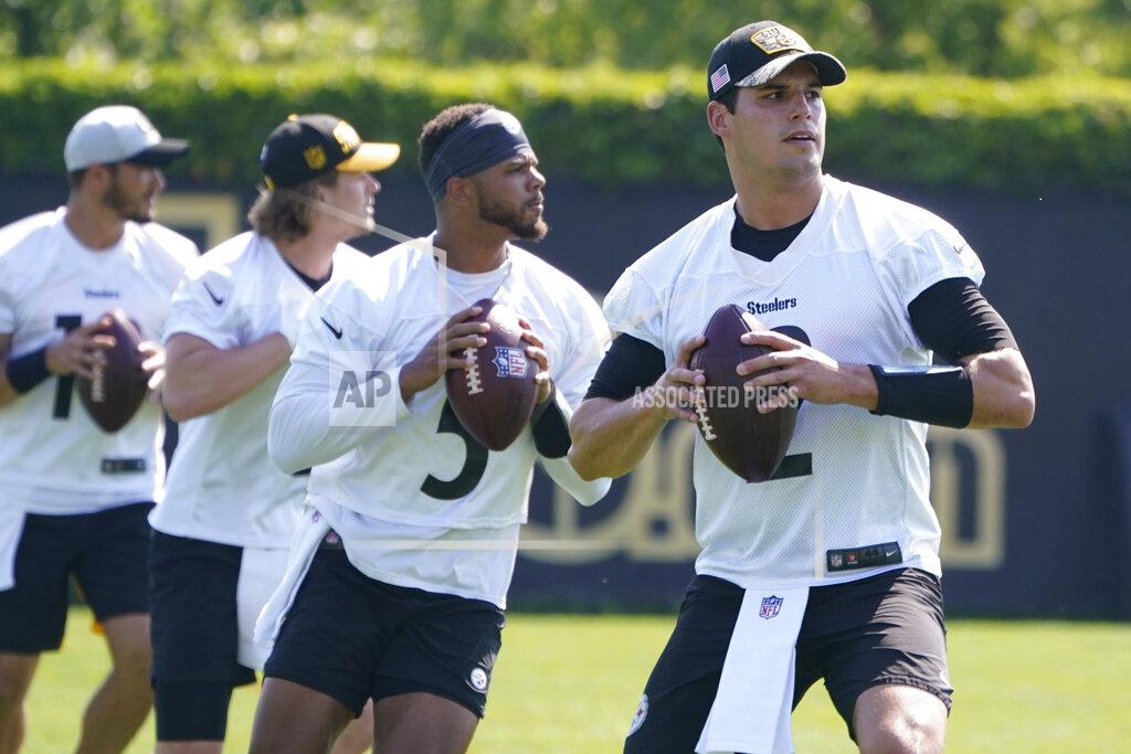 Keith Srakocic Pittsburgh Steelers quarterbacks, right to left, Mason Rudolph, Chris Oladokin, Kenny Pickett and Mitch Trubisky go through drills during an NFL football practice, Tuesday, May 31, 2022, in Pittsburgh. (AP Photo/Keith Srakocic)