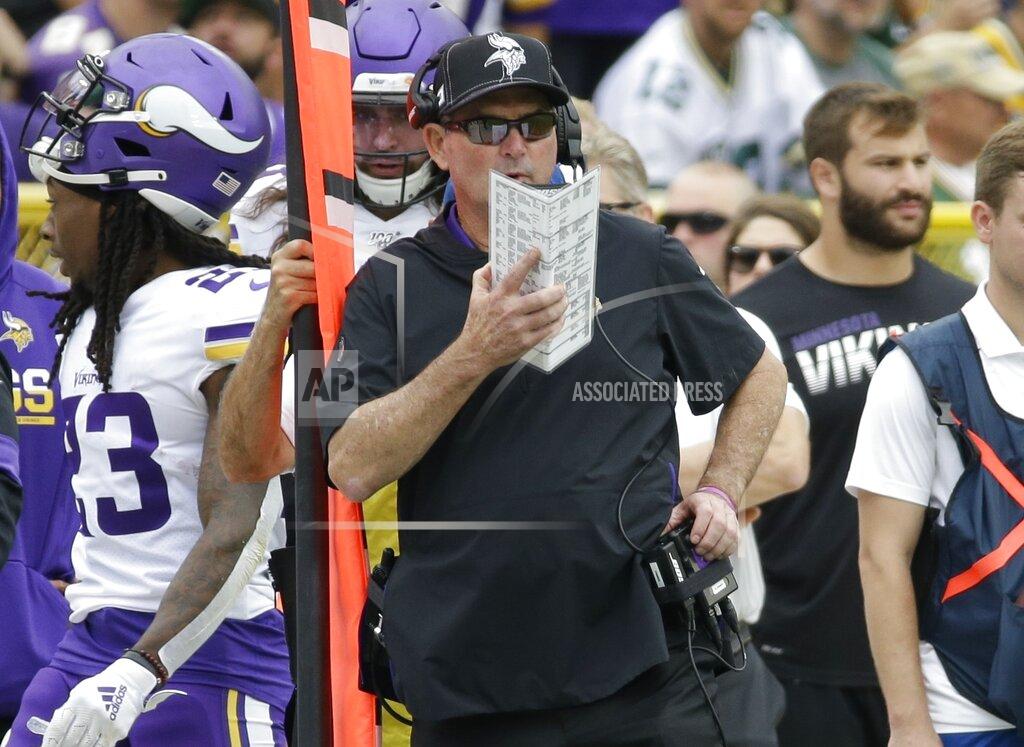 Mike Roemer Minnesota Vikings head coach Mike Zimmer calls a play during the first half of an NFL football game against the Green Bay Packers Sunday, Sept. 15, 2019, in Green Bay, Wis. (AP Photo/Mike Roemer)