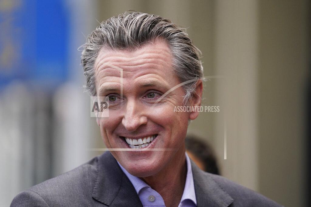 Eric Risberg California Gov. Gavin Newsom smiles during a news conference in San Francisco, on Thursday, June 3, 2021. California Gov. Gavin Newsom has signed an executive order that will lift most of the state's coronavirus rules. The order Newsom signed Friday, June 11, 2021, takes effect on Tuesday. It will end the state's stay-at-home order and its various amendments. (AP Photo/Eric Risberg)