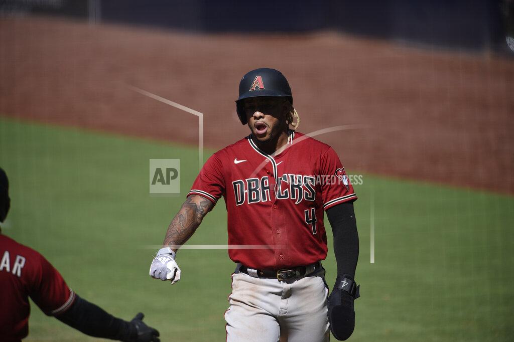 Kelvin Kuo Arizona Diamondbacks' Ketel Marte is congratulated after scoring a run during the eighth inning of the team's baseball game against the San Diego Padres in San Diego, Sunday, July 26, 2020. The Diamondbacks won 4-3. (AP Photo/Kelvin Kuo)