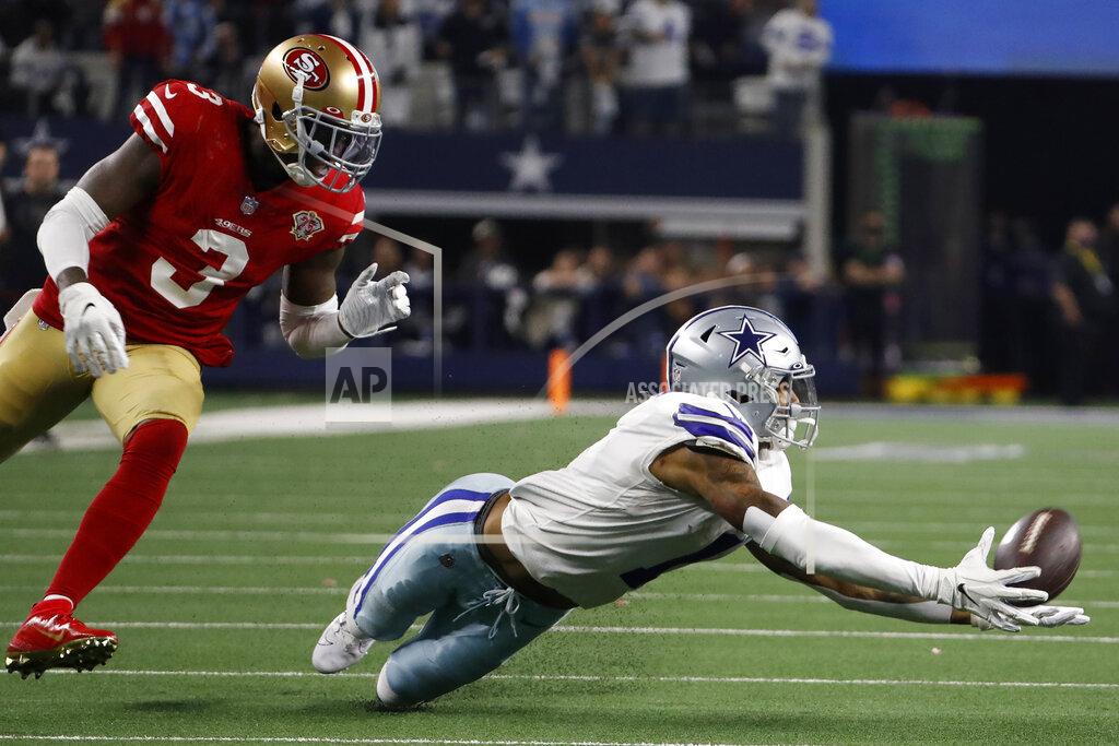 Roger Steinman Dallas Cowboys wide receiver Cedrick Wilson, right, cannot catch a pass in front of San Francisco 49ers safety Jaquiski Tartt (3) during the second half of an NFL wild-card playoff football game in Arlington, Texas, Sunday, Jan. 16, 2022. (AP Photo/Roger Steinman)