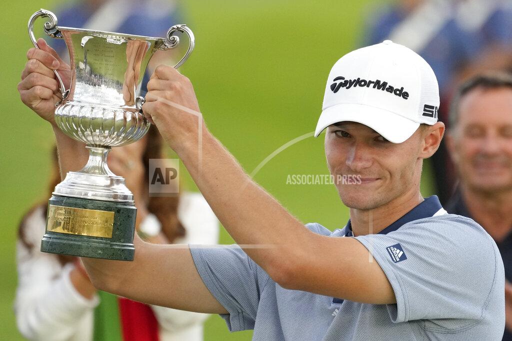 Andrew Medichini Nicolai Hojgaard of Denmark hold the trophy of the Italian Open golf tournament he just won, in Guidonia, in the outskirts of Rome, Sunday, Sept. 5, 2021. The Italian Open took place on the redesigned Marco Simone course just outside Rome that will host the 2023 Ryder Cup.(AP Photo/Andrew Medichini)
