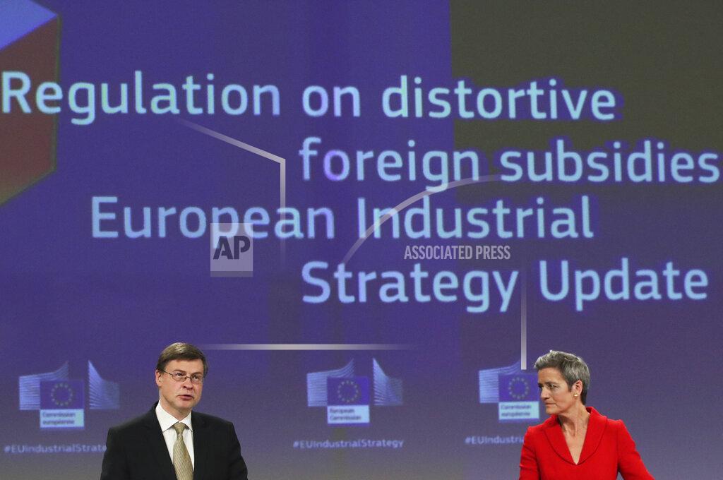 Yves Herman European Commission Vice Presidents Margrethe Vestager, right, and Valdis Dombrovskis participate in a media conference on the proposal for a Regulation to address distortions caused by foreign subsidies in the Single Market and on the European Industrial Strategy Update at EU headquarters in Brussels, Wednesday, May 5, 2021. (Yves Herman, Pool via AP)
