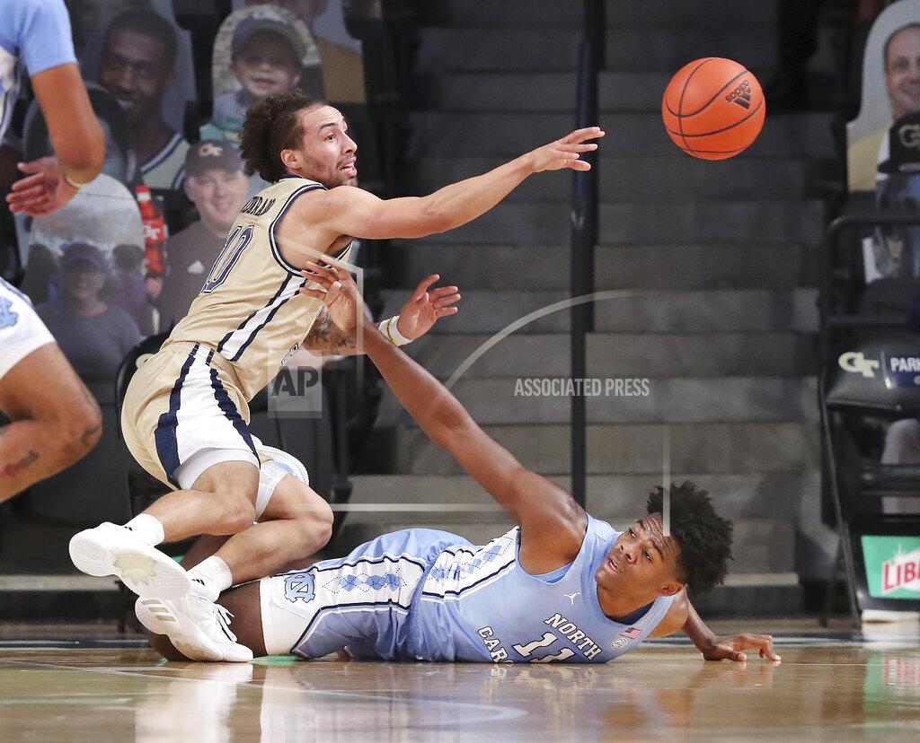 Curtis Compton FILE - Georgia Tech guard Jose Alvarado steals the ball from North Carolina forward Day'Ron Sharpe during the first half of an NCAA college basketball game in Atlanta, in this Wednesday, Dec. 30, 2020, file photo. Alvarado ranks among the ACC leaders in several categories, including scoring, steals and assists, and his production is crucial to Georgia Tech’s goal to make its first NCAA appearance since 2010. (Curtis Compton/Atlanta Journal-Constitution via AP, Pool, File)