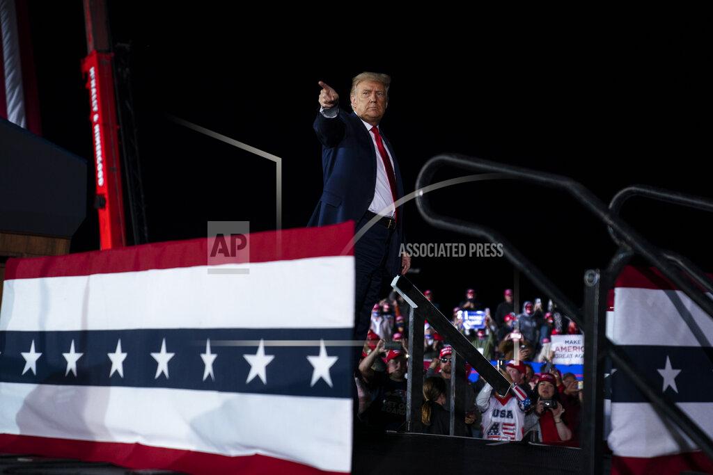 Evan Vucci FILE - In this Sept. 10, 2020, file photo President Donald Trump points to the crowd after speaking during a campaign rally at MBS International Airport, in Freeland, Mich. (AP Photo/Evan Vucci, File)