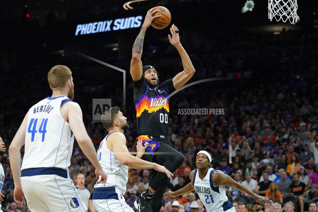 Matt York Phoenix Suns center JaVale McGee (00) dunks over Dallas Mavericks forward Maxi Kleber during the first half of Game 7 of an NBA basketball Western Conference playoff semifinal, Sunday, May 15, 2022, in Phoenix. (AP Photo/Matt York)