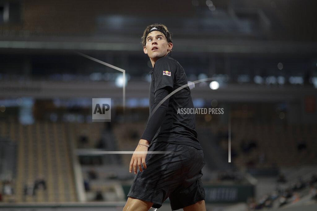 Alessandra Tarantino Austria's Dominic Thiem looks back in the first round match of the French Open tennis tournament against Croatia's Marin Cilic at the Roland Garros stadium in Paris, France, Monday, Sept. 28, 2020. (AP Photo/Alessandra Tarantino)
