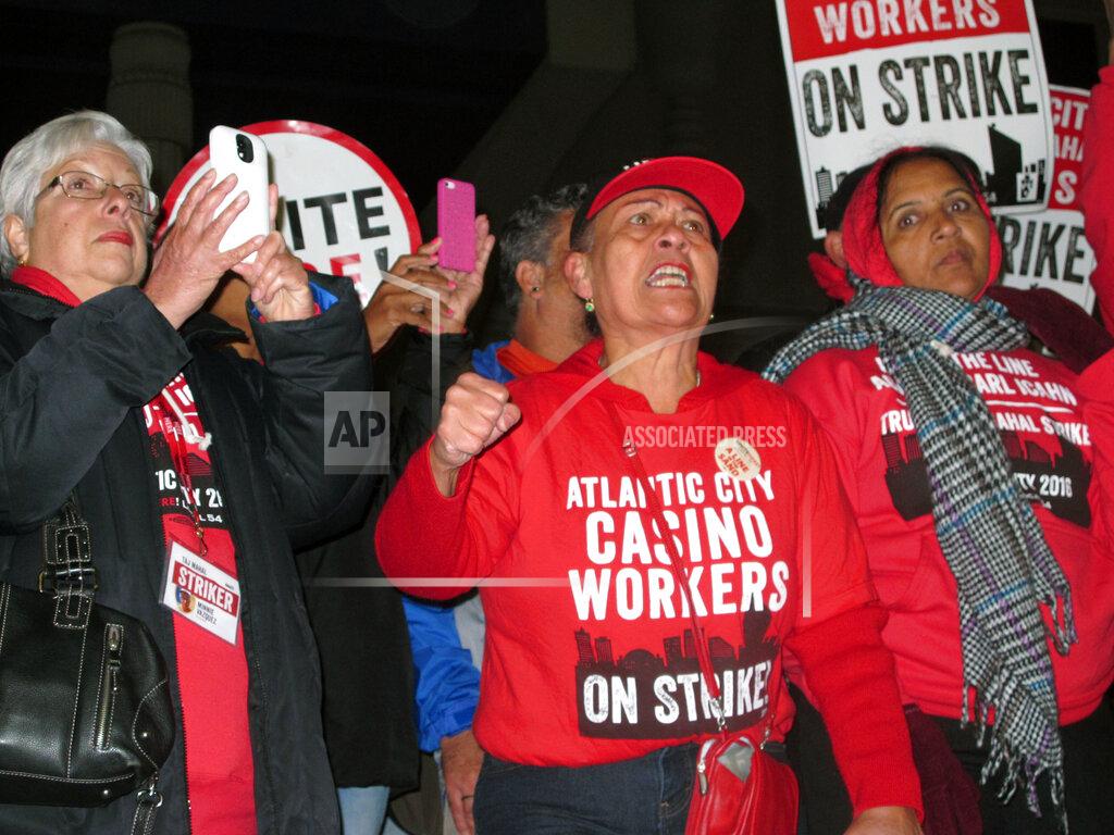 Wayne Parry Striking union members protest outside the Trump Taj Mahal casino in Atlantic City N.J. as it shut down on Oct. 10, 2016. On May 20, 2022, the union launched a web site warning casino customers that "labor disputes" could happen if the casinos don't reach new contracts by the May 31 deadline. (AP Photo/Wayne Parry)