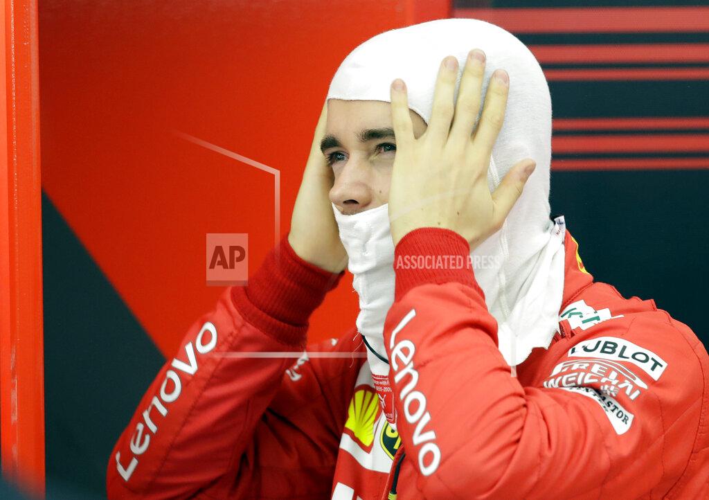 Luca Bruno Ferrari driver Charles Leclerc of Monaco prepares for the second free practice at the Formula One Bahrain International Circuit in Sakhir, Bahrain, Friday, March 29, 2019. The Bahrain Formula One Grand Prix will take place on Sunday. (AP Photo/Luca Bruno)
