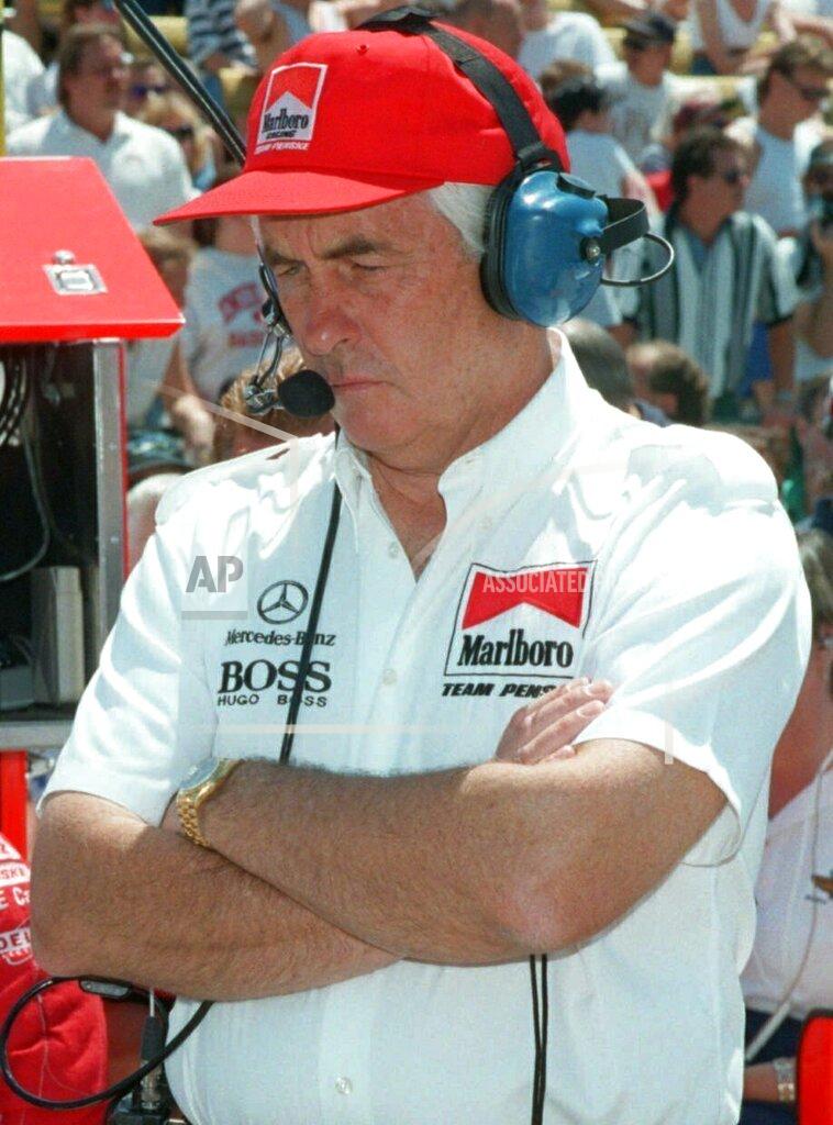 Tom Strickland FILE - In this May 20, 1995, file photo, car owner Roger Penske stands in the pit area at the Indianapolis Motor Speedway during the third day of qualifications for the Indianapolis 500 at Indianapolis Motor Speedway in Indianapolis. Defending champion Al Unser Jr. and Emerson Fittipaldi failed to qualify. Chip Ganassi and Michael Andretti have joined Roger Penske in calling for guaranteed spots in the Indianapolis 500. The team owners argue their financial commitment to IndyCar is too steep to afford missing out on the biggest race of the year. (AP Photo/Tom Strickland, File)