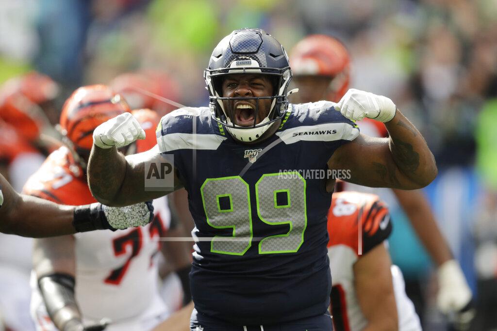 Stephen Brashear Seattle Seahawks defensive tackle Quinton Jefferson (99) reacts after he sacked Cincinnati Bengals quarterback Andy Dalton during the second half of an NFL football game Sunday, Sept. 8, 2019, in Seattle. (AP Photo/Stephen Brashear)