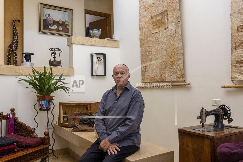 Tsafrir Abayov Dr Shmuel Rosenman, chairman of the March of the Living poses for a photo at his house in Moshav Hemed, Israel, Wednesday, April 7, 2021. The March of the Living is saluting medical heroes this year. The annual Holocaust education event is usually marked with a march on the grounds of the former Auschwitz death camp in Poland. But for a second straight year it is being held virtually due to the coronavirus pandemic. (AP Photo/Tsafrir Abayov)