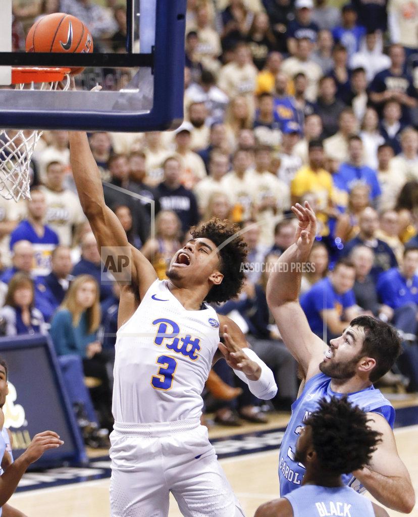 Keith Srakocic Pittsburgh's Malik Ellison (3) shoots after getting past North Carolina's Luke Maye, right, and Leaky Black (1) during the first half of an NCAA college basketball game, Saturday, Jan. 5, 2019, in Pittsburgh. (AP Photo/Keith Srakocic)