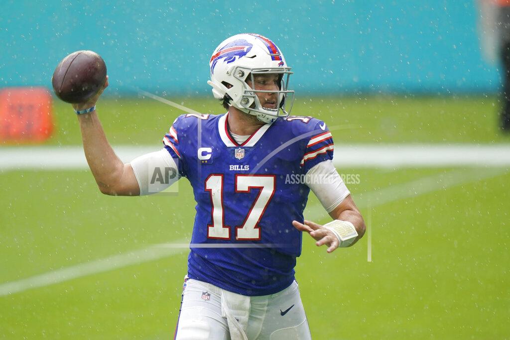 Wilfredo Lee Buffalo Bills quarterback Josh Allen (17) throws a touchdown pass, during the first half of an NFL football game against the Miami Dolphins, Sunday, Sept. 20, 2020 in Miami Gardens, Fla. (AP Photo/Wilfredo Lee)