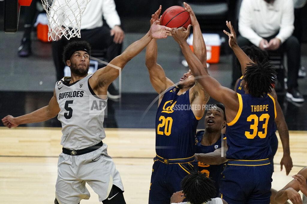 John Locher Colorado's D'Shawn Schwartz (5), California's Matt Bradley (20) and D.J. Thorpe (33) vie for a rebound during the second half of an NCAA college basketball game in the quarterfinal round of the Pac-12 men's tournament Thursday, March 11, 2021, in Las Vegas. (AP Photo/John Locher)