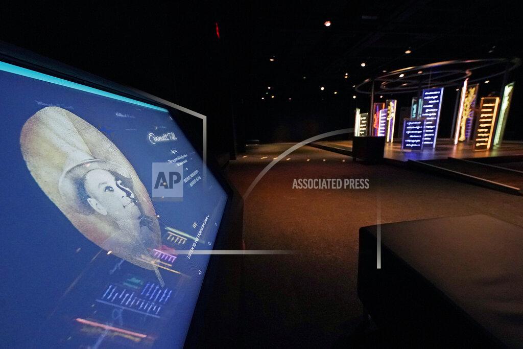Rogelio V. Solis An interactive kiosk, left, sits across from the PBS Frontline's traveling augmented-reality exhibit, "Un(re)solved" in the special exhibit room, Friday, Aug. 27, 2021. The exhibit was opened on Saturday, Aug. 28, to align with the commemoration of the death of Emmett Till, a Chicago teenager who was lynched in Mississippi in 1955. The multi-media platforms examine the federal government's efforts to investigate more than 150 civil rights era cold cases on the Emmett Till Unsolved Civil Rights Crime Act. (AP Photo/Rogelio V. Solis)