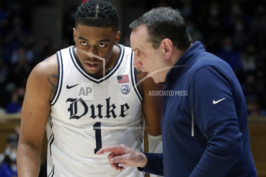 Chris Seward Duke head coach Mike Krzyzewski confers with guard Trevor Keels (1) during the second half of an NCAA college basketball game, Monday, Feb. 7, 2022, in Durham, N.C. (AP Photo/Chris Seward)