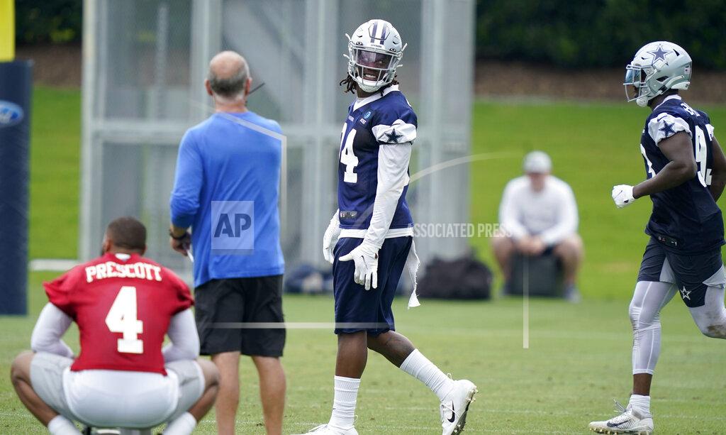Lm Otero Dallas Cowboys defensive end Randy Gregory (94) walks the field during an NFL football team practice Wednesday, June 9, 2021, in Frisco, Texas. Gregory isn't ashamed of a suspension-filled past that nearly derailed his NFL career, just maybe a little tired of it being the focus of his story. (AP Photo/LM Otero)