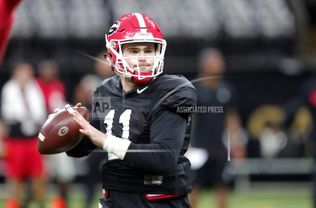 Gerald Herbert Georgia quarterback Jake Fromm (11) practices at the Superdome in New Orleans, Friday, Dec. 28, 2018. Georgia will face Texas in the Sugar Bowl NCAA college football game on Jan. 1, 2019. (AP Photo/Gerald Herbert)