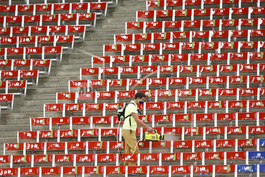 Liz Martin The stands are sanitized after an 8-man high school football semifinal playoff game between Montezuma and Remsen St. Mary's at the UNI-Dome in Cedar Falls, Iowa, Thursday, Nov. 12, 2020. (Liz Martin/The Gazette via AP)