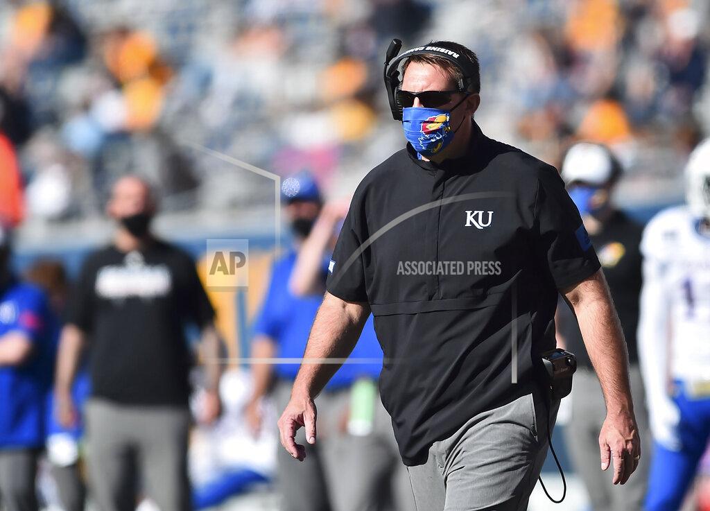 William Wotring Kansas acting head coach Joshua Eargle looks on against West Virginia during an NCAA college football game, Saturday, Oct. 17, 2020, in Morgantown, W.Va. (William Wotring/The Dominion-Post via AP)
