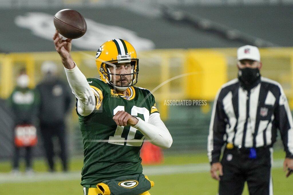 Morry Gash Green Bay Packers' Aaron Rodgers throws a touchdown pass during the second half of an NFL football game against the Philadelphia Eagles Sunday, Dec. 6, 2020, in Green Bay, Wis. The pass was Rodgers' 400th career touchdown pass. (AP Photo/Morry Gash)