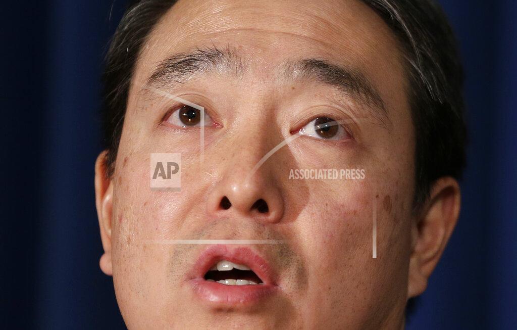 Seth Wenig FILE - In this Tuesday, Dec. 12, 2017 photo, Joon H. Kim, acting U.S. Attorney for the Southern District of New York, speaks to reporters during a news conference in New York. New York Attorney General Letitia James named Kim and employment lawyer Anne Clark to lead the investigation sexual harassment allegations against New York Gov. Andrew Cuomo by several of his female aides. James said the pair are "independent, legal experts who have decades of experience conducting investigations and fighting to uphold the rule of law." (AP Photo/Seth Wenig, File)