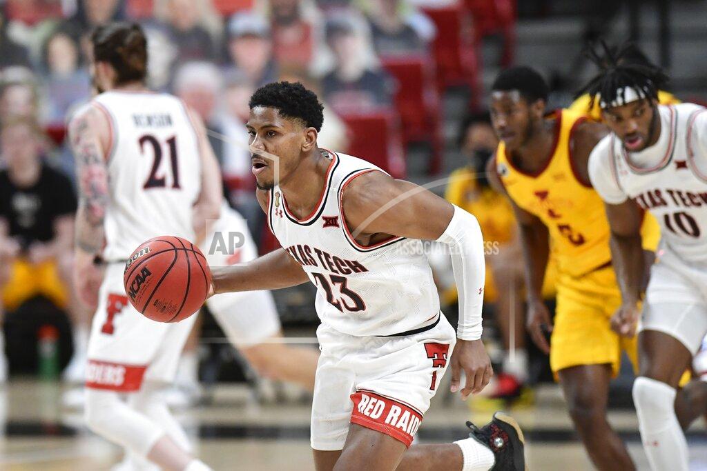 Justin Rex Texas Tech's Chibuzo Agbo (23) brings the ball up during the second half of the team's NCAA college basketball game against Iowa State in Lubbock, Texas, Thursday, March 4, 2021. (AP Photo/Justin Rex)
