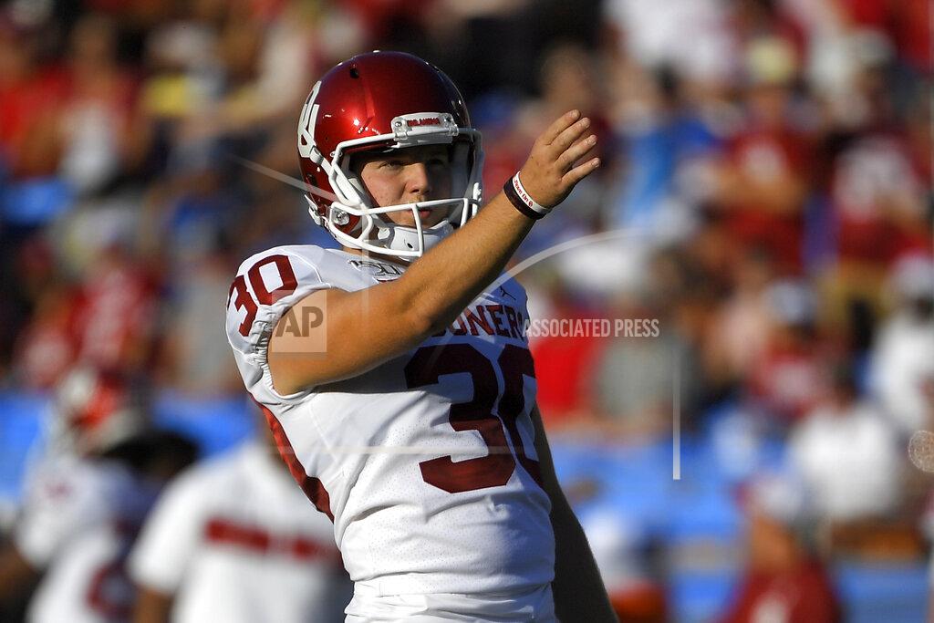 Mark J. Terrill FILE - In this Saturday, Sept. 14, 2019 file photo, Oklahoma place kicker Calum Sutherland lines up a kick during the first half of an NCAA college football game against UCLA in Pasadena, Calif. Early Saturday, Sept. 21, 2019, Sutherland was arrested on a public intoxication charge, according to records from the Cleveland County Sheriff's Office in Norman, Okla. (AP Photo/Mark J. Terrill)