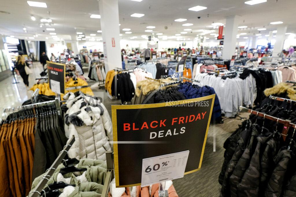 Ringo H.w. Chiu A "Black Friday Deals" sign is displayed as a few shoppers are seen at a store at the Glendale Galleria in Glendale, Calif., Friday, Nov. 27, 2020. (AP Photo/Ringo H.W. Chiu)