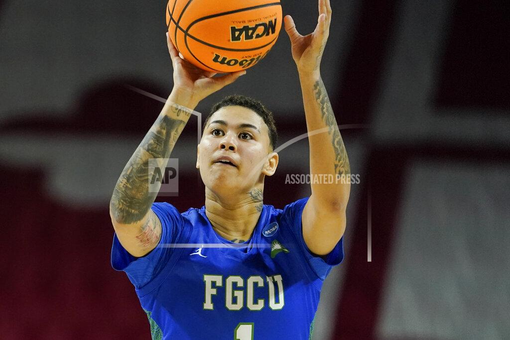 Julio Cortez Florida Gulf Coast guard Kierstan Bell shoots against Maryland during the first half of a college basketball game in the second round of the NCAA tournament, Sunday, March 20, 2022, in College Park, Md. (AP Photo/Julio Cortez)