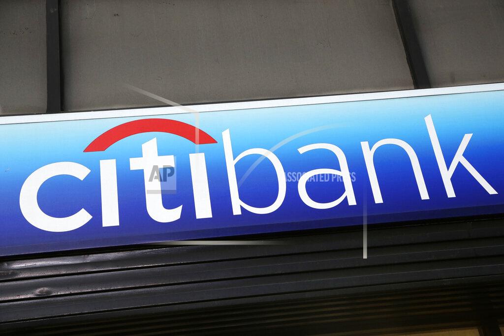Mark Lennihan FILE - In this Jan. 15, 2015, file photo, a Citibank sign hangs above a branch office in New York. The tens of millions of consumers and businesses out of work from the coronavirus pandemic weighed heavily on the financial results of Wall Street’s biggest banks on Tuesday, July 14, 2020, with the likes of JPMorgan Chase, Wells Fargo and Citigroup setting aside tens of billions of dollars to cover potentially bad loans that were just fine only a few months ago. (AP Photo/Mark Lennihan, File)