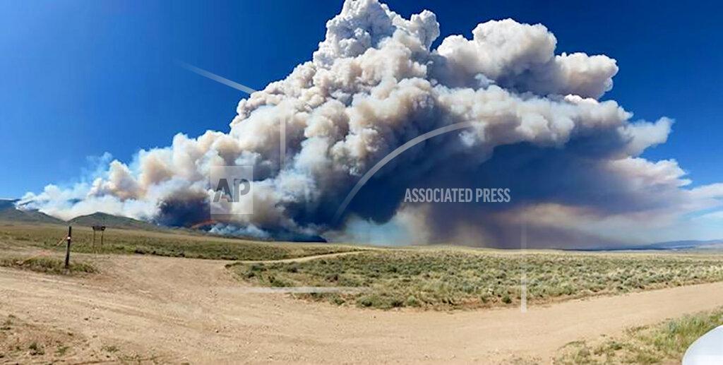 Amy Hyfield In this photo provided by the U.S. Forest Service, the Robertson Draw fire burns south of Red Lodge, Mont., Tuesday, June 15, 2021. The fire grew rapidly Tuesday amid a heat wave and gusting winds. (Amy Hyfield/U.S. Forest Service via AP)