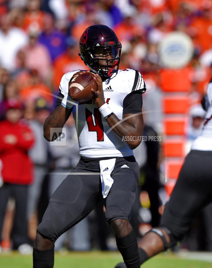 Richard Shiro Louisville quarterback Jawon Pass drops back to pass during the first half of an NCAA college football game against Clemson Saturday, Nov. 3, 2018, in Clemson, S.C. (AP Photo/Richard Shiro)