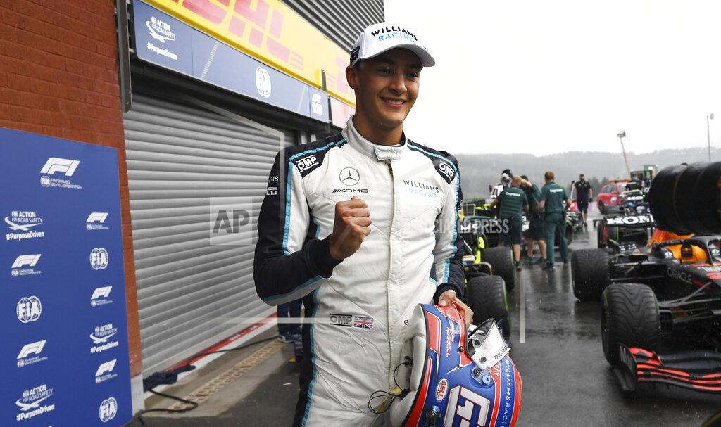 Second place Williams driver George Russell of Britain jubilates after qualification ahead of the Formula One Grand Prix at the Spa-Francorchamps racetrack in Spa, Belgium, Saturday, Aug. 28, 2021. The Belgian Formula One Grand Prix will take place on Sunday. (John Thys, Pool Photo via AP)